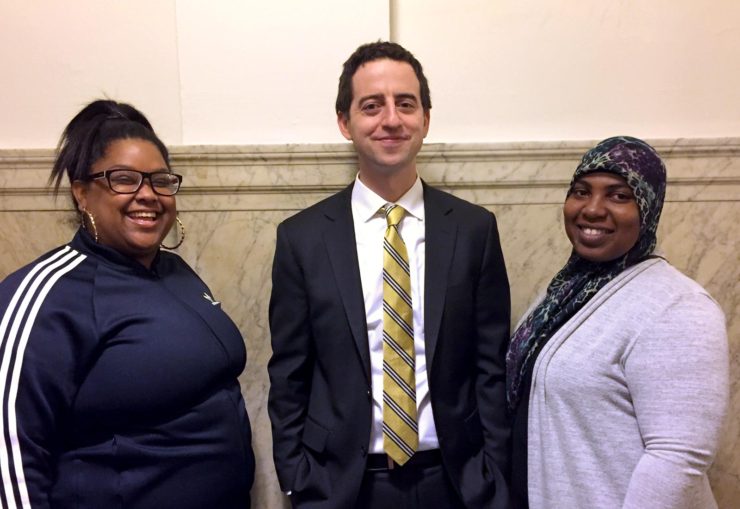 Staff attorney Dan Urevick-Ackelsberg and his clients Yazmin Vazquez (left) and Gerrell Martin (right). Yazmin and Gerrell are tenants fighting for their rights.