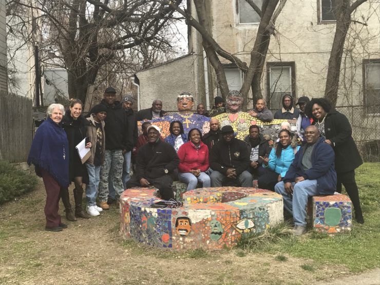Ebony Griffin (back row, furthest right) and New Jerusalem gardeners, supporters, and residents.