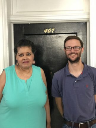 Ms. Harrison and George Donnelly in front of her apartment