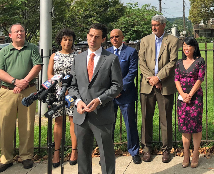 Staff attorney Dan Urevick-Ackelsberg speaking at a press conference advocating for safe school facilities. Students in Philadelphia began the year facing extreme heat in classrooms, leading to early dismissals and lost instructional time.