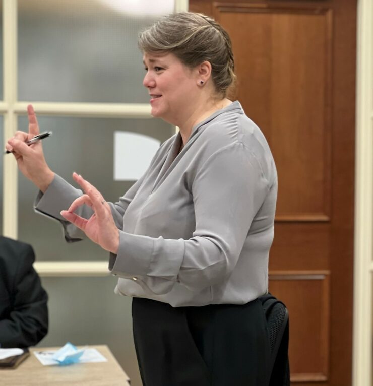 O'Melveny attorney Katrina Robson addressing the legal team for petitioners in the school funding trial following opening statements.