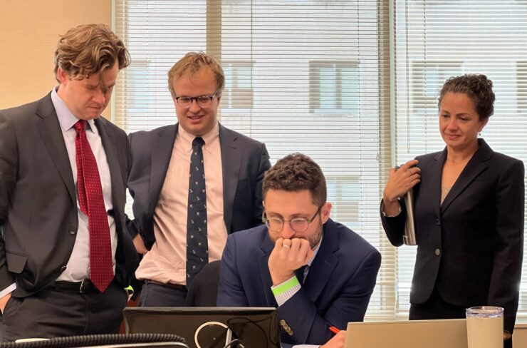 From left to right: O'Melveny attorneys Chris Burke, Harry Liberman, Eli Grossman, and Law Center staff attorney Claudia De Palma working during the school funding trial.