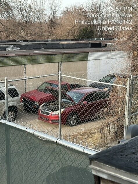 Defendants unlawfully deposit disabled cars, double-park cars, perform auto bodywork and block the shared alleyway. Picture taken by Plaintiff Mr. Bell, February 7, 2023.