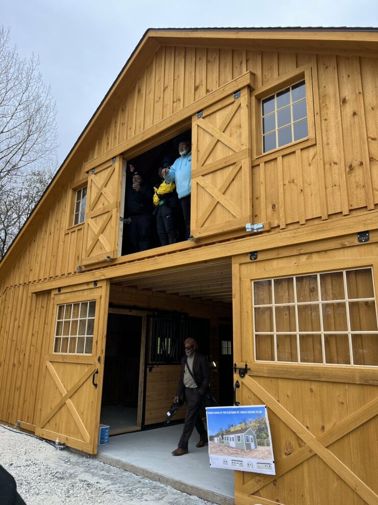 Fletcher Street leaders check out the new barn and stables